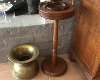 Antique spittoon and standing cigarette ashtray