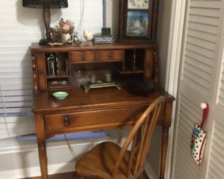 cute secretary and Windsor chair