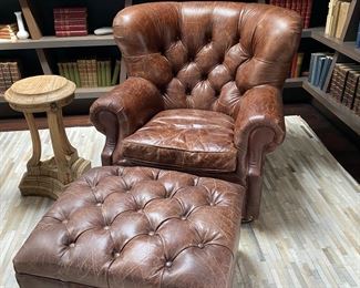 Now $2240.00 - Was $3,200.00 Pair Restoration Hardware “Churchill” leather chairs & ottomans  Chairs: 36"h x 38"w x 40"d                                             Ottomans: 16"h x 28"w x 23"d  *tear to one arm