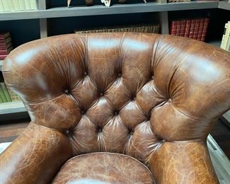 Now $2240.00 - Was $3,200.00 Pair Restoration Hardware “Churchill” leather chairs & ottomans  Chairs: 36"h x 38"w x 40"d                                             Ottomans: 16"h x 28"w x 23"d  *tear to one arm