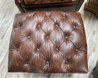 Now $2240.00 - Was $3,200.00 Pair Restoration Hardware “Churchill” leather chairs & ottomans  Chairs: 36"h x 38"w x 40"d                                             Ottomans: 16"h x 28"w x 23"d  *tear to one arm