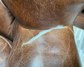 Now $2240.00 - Was $3,200.00 Pair Restoration Hardware “Churchill” leather chairs & ottomans  Chairs: 36"h x 38"w x 40"d                                             Ottomans: 16"h x 28"w x 23"d  *tear to one arm