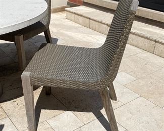 Now $525.00 - Was $750.00 Five Janus et Cie woven dining chairs