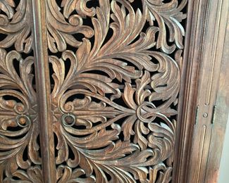 Now $595.00 - Was $850.00 British Colonial-style carved wood cabinet       65"h x 61"w x 26"d