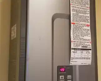 Rinnai tankless hot water heater; model RL94i