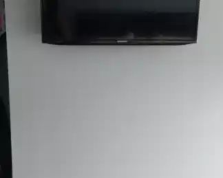 Wall mounted 36" flat screen TV