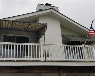 Fixed awning; limited amount of vinyl railing