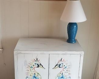 Pretty painted seahorse cupboard