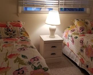 Nightstand matches dresser; twin beds