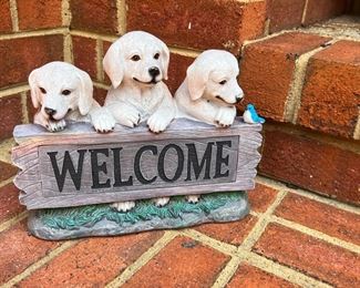 Yellow Labs "Welcome" Sign