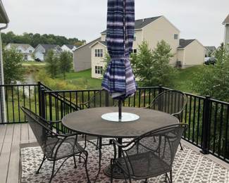Patio table, chairs, umbrella 