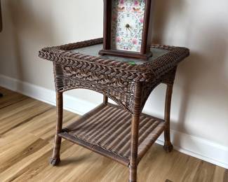 Wicker end table, embroidered clock 