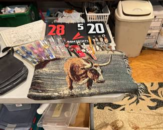Some cool Disney watches in their original packaging, a great cowboy themed blanket, score board for volleyball or other sports 