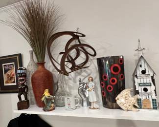 Living room shelf totally full of cool decor in… Close-ups of most of these items later