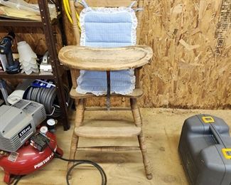 It's an antique highchair WITH THE TRAY! We never see the tray! Awesome! 