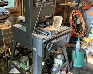 Band saw, shed full of tools, work table
