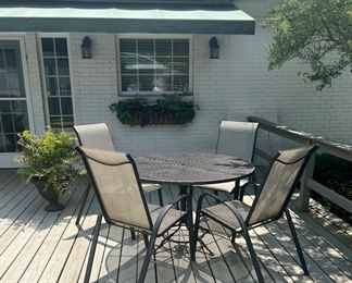 Patio set- 4 chairs and round metal table- $200