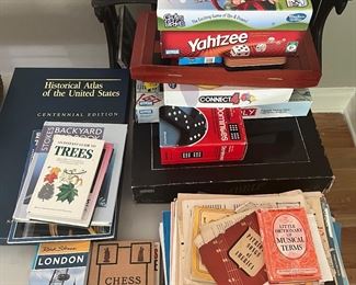 assorted books and games