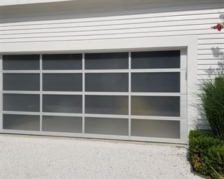 Contemporary garage door approx. 16 ft. x 7 ft.