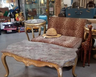 Italian marble top parlor tables available inside AVW now. Leopard chair just sold
