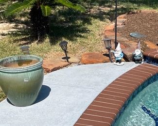 $10 each Gnomes 
$20 - Large Ceramic Pot 