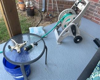 $20 - Small Glass Table 
$26Hose Holder with Hose 
