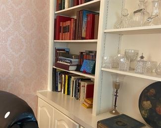 Books and crystal wine bottles