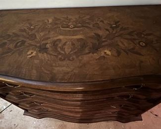 A better view of the beautiful inlay work on this chest.