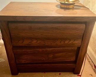 Solid two-drawer wood night stand.