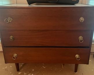 Aren't the lion pulls on this chest simply magnificent? Those MCM legs though! Boom-chicka-boom. Sexy! What a great, useful accent piece for any room.