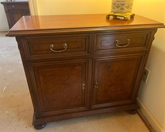 This is a Salva brand console table. Beautiful wood work.