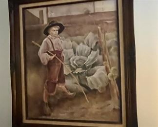 Genre scene of a boy with giant cabbage in a garden.