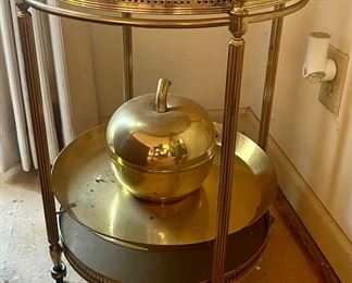 Brass rolling serving cart/table. The uses are endless!