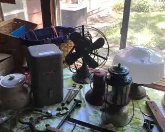 Coleman lanterns and vintage fan 