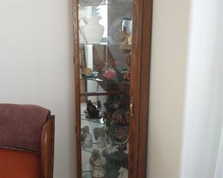 Corner cabinet is for sale and all items inside are for sale.