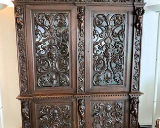 Antique carved walnut armoire