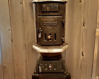 Vintage Cast Iron Parlor Comfort Stove $195 or bid #21