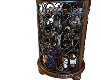 MAKE OFFER.  ALL OFFERS CONSIDERED.  $240 USD      Metal Round Wood Topped Wine Cabinet LA178-14    Description: Lamps Plus antique style real wood (walnut wood) and metal round cabinet. With beautiful latch to open inside and decorate it with your favorite items.
Dimensions: 26 x 26 x 40"H
Condition: Very good condition. 
Local pick up Potomac, MD.  Located on first floor.  Contact us for shipper suggestions.      https://goodbyhello.com/products/la178-14?_pos=12&_sid=f4cf1db7b&_ss=r