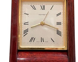$500 - Vintage Antique Asprey Swiss Quartz Rosewood Case Folding Travel Watch Clock                                                      Up for sale is Vintage Antique presentation Asprey Swiss made, Quartz Wood Travel Clock. Measuring 4 1/2” by 3” closed. Excellent condition visually with some very light scratches on the surface. Not tested for functionality, possibly needs battery replacement. Please see photos as part of the description. 

Dimensions: 4.5 x 3"

Condition: Excellent visual condition.  Not tested for functionality