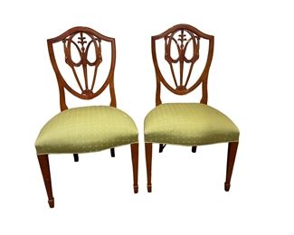 $2000 USD    2 Arm 2 Side Hepplewhite Style Shield Back Dining Chairs SL86-3    The design and execution of this chair are of the finest quality and exhibit the distinct features found on New York chairs. The crisp detailed carving of the drapery swags and central plum on the splat is framed in a shield-back. The delicate flared out tapered legs are embellished with overlapping husk inlay patterns and highlighted with fine line inlay terminating into the cuffs. The style of inlay is also characteristic of pieces found in New York.

Dimensions: 38 5/8"h (crest); 18"h (seat); 21"w x 18"d (seat); 20 1/2"d (legs)

Side Chairs = 21 x 22 x 37.5  Seat=19

Arm chairs = 21 x 22 x 37.5  Seat = 29  Arms = 28.5

Condition: Tears in fabric.  Will need to be reupholstered

Local pick up Chevy Chase, MD.  Contact us for shipper suggestions.      https://goodbyhello.com/products/2-arm-2-side-hepplewhite-dining-chairs-sl86-3?_pos=6&_sid=8c943c460&_ss=r