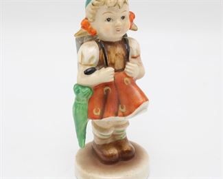 Young Schoolgirl Ceramic Figurine
