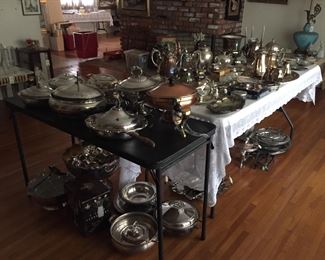 Tables full of silver serving pieces- Up to 75% OFF.