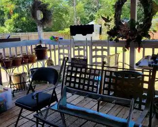 Pottery. Bench. Ladderback Chairs. 