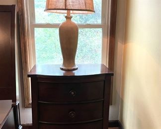 king bed set bedside table and ivory lamp