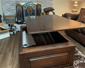 wood coffee table with raised lid and internal storage
