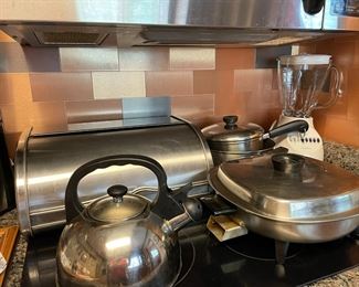 kettle, breadbox, blender, pots, pans