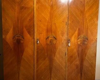 Antique wood wardrobe with three locking doors