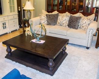Upholstered 3 cushion couch, large wooden coffee table