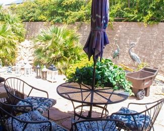 Outdoor table, umbrella, and chairs (x4)