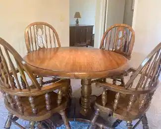 Double pedestal solid oak round dining table with 4 chairs, 2 extensions leaf's